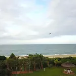 Casa pé na areia em praia paradisíaca